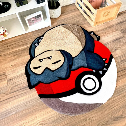 Sleeping Snorlax on Poké Ball Rug