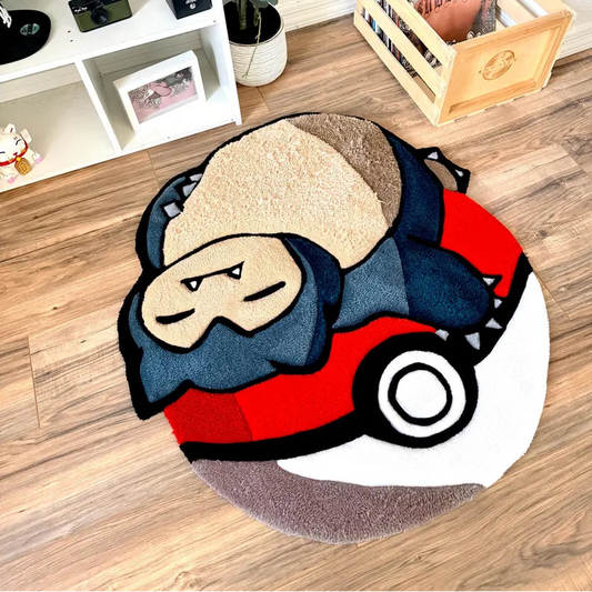 Sleeping Snorlax on Poké Ball Rug